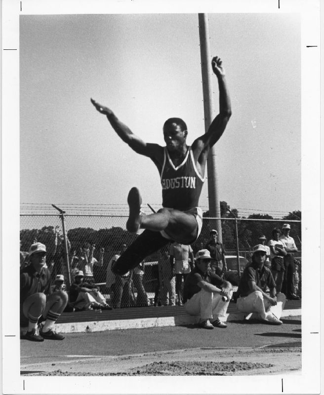 Carl Lewis in mid-jump