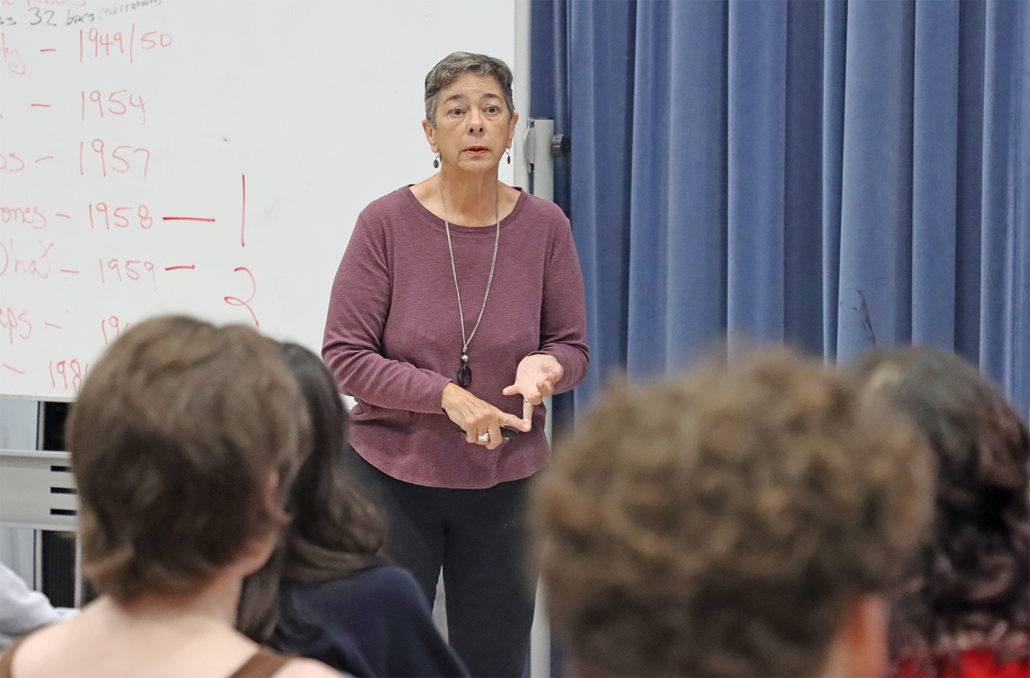 Photo of Donna Amtsberg teaching students at the Moores Opera Center.