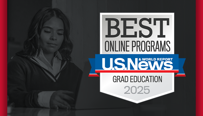 Student sitting at a laptop at a computer: BEST ONLINE PROGRAMS; U.S. News & World Report GRAD EDUCATION 2025
