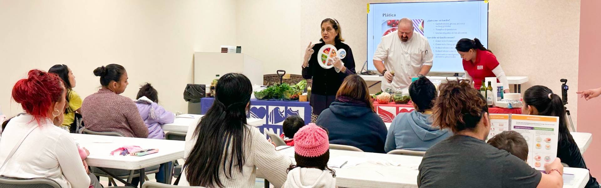Professor giving a lecture to an audience about nutrition.