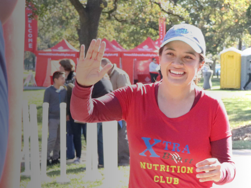 A women running to the finish line
