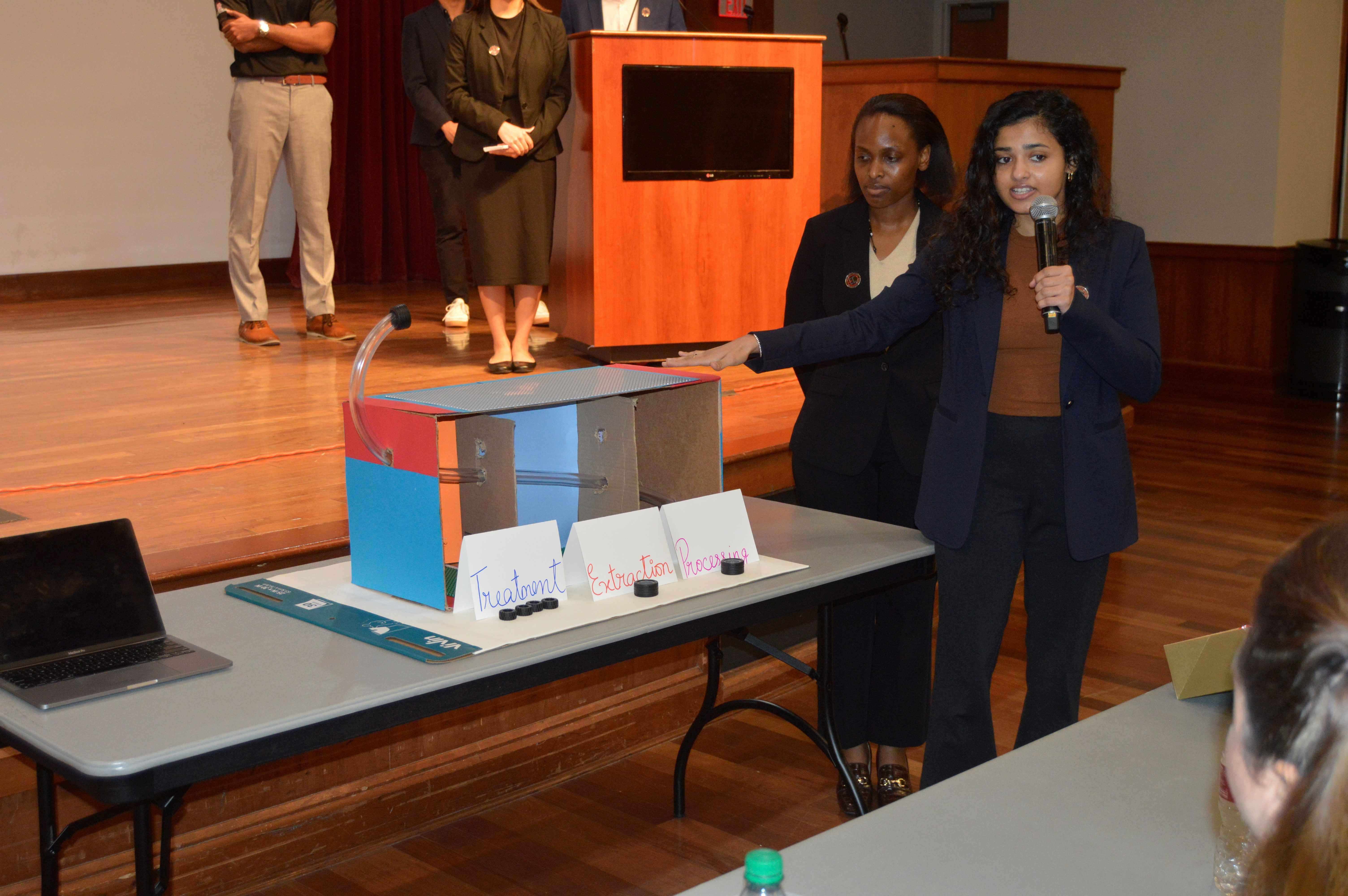 Team Energy Coalition presenting their prototype
