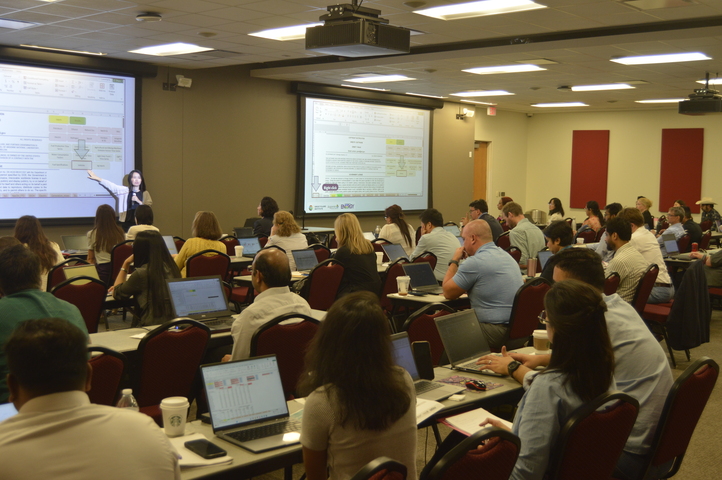 xiang instructs audience at greet workshop