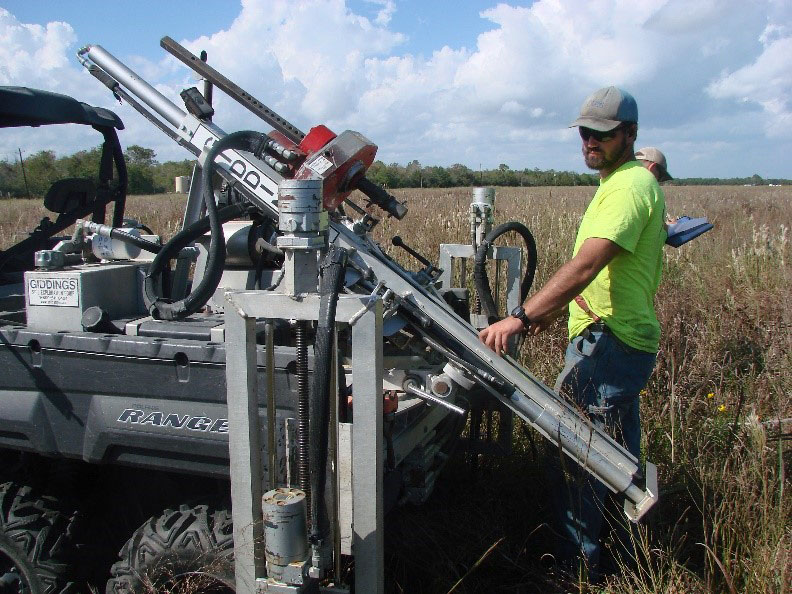 People studying soil carbon baseline.