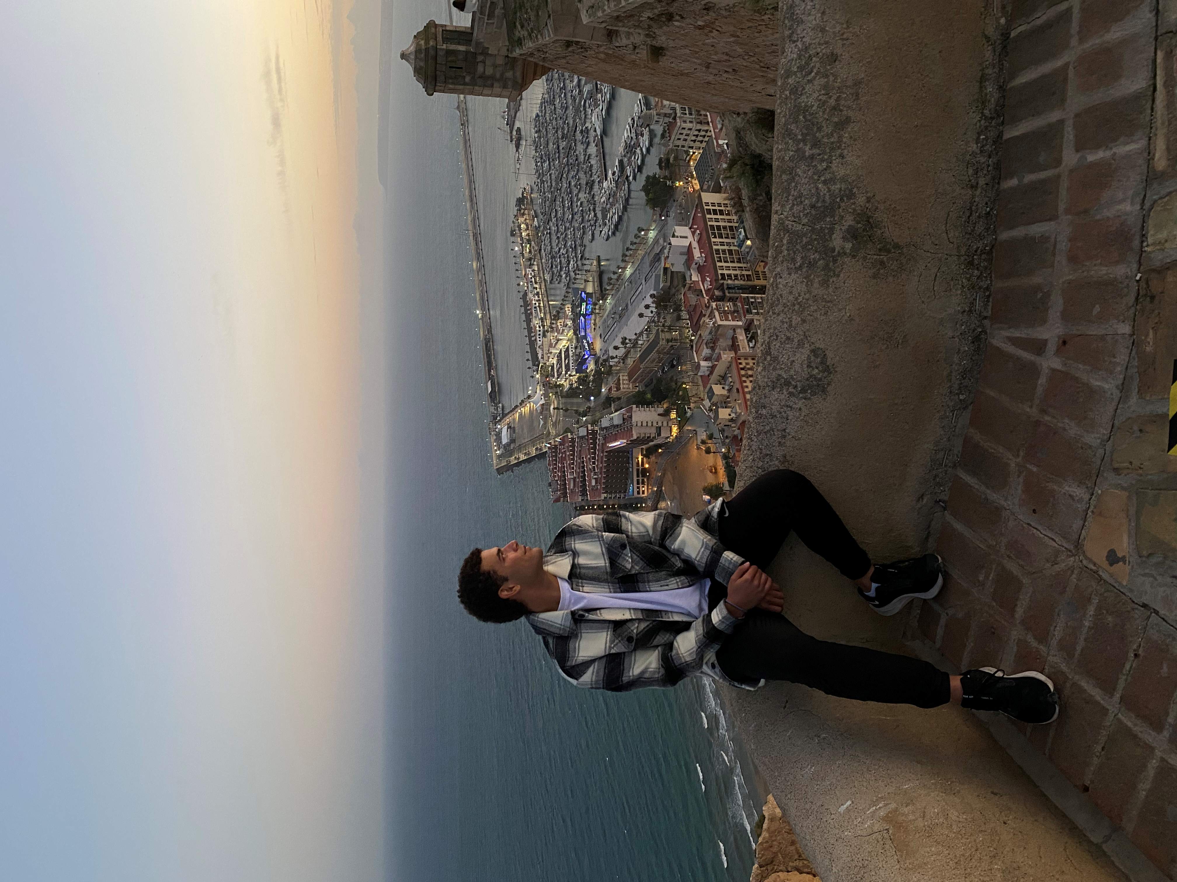 photo of student in front of the Castillo Santa Barbara, Alicante, Spain, 2022