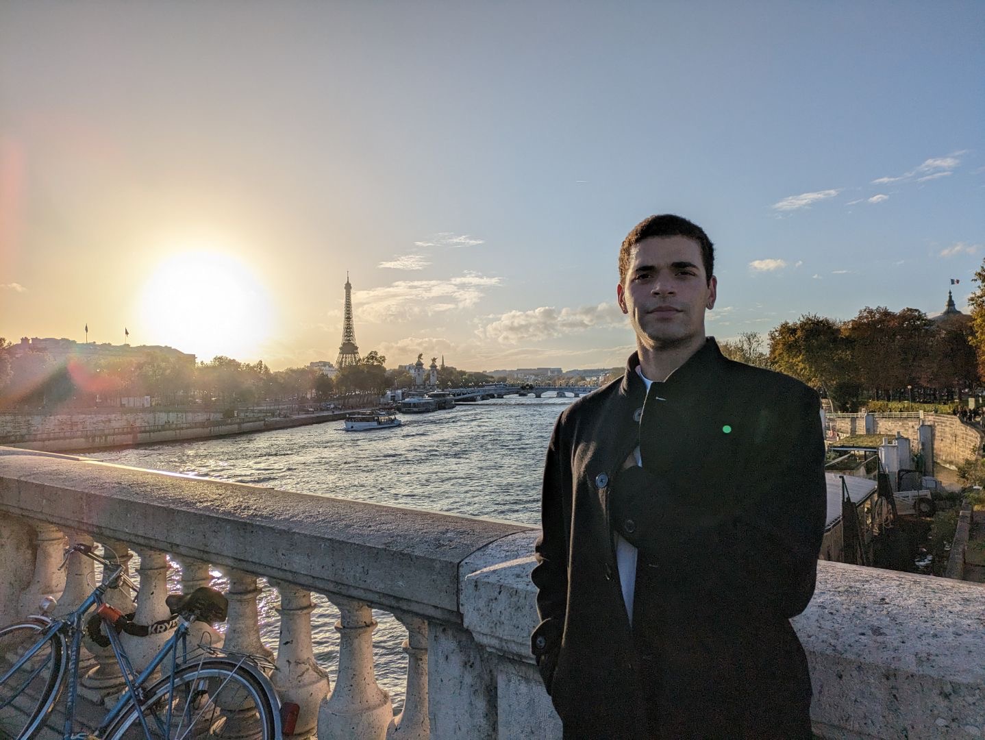 photo of student in front of the eiffel tower