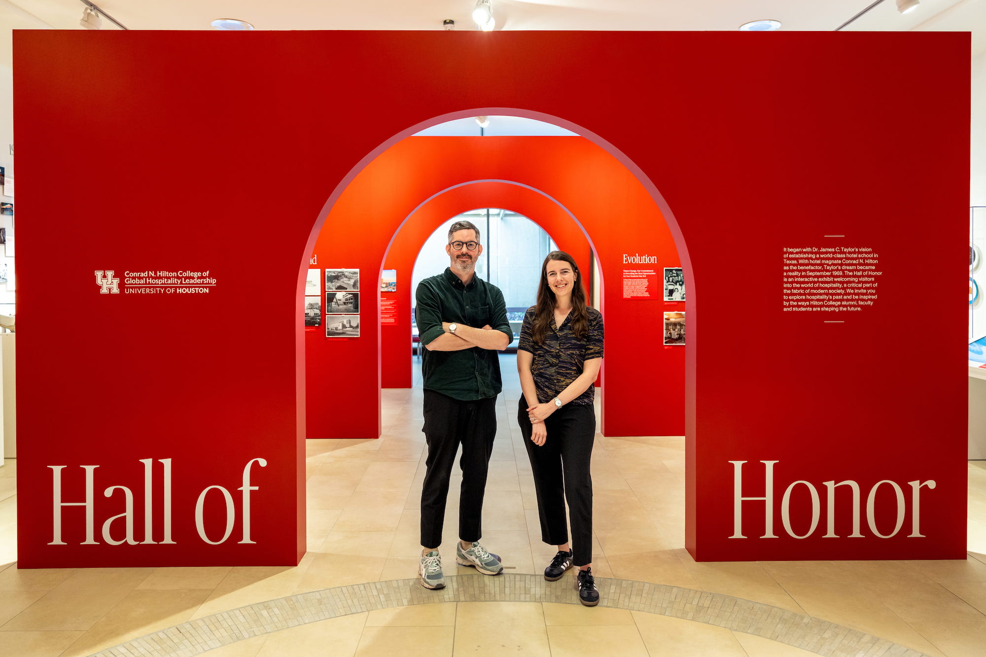 two people standing in archway