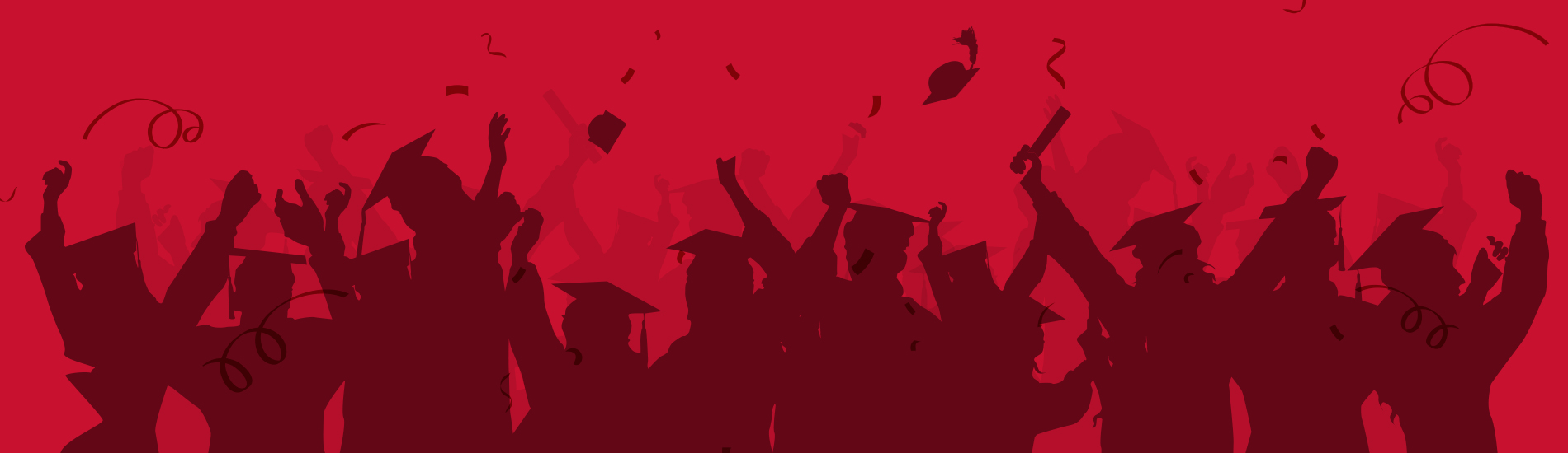 students tossing their graduation caps