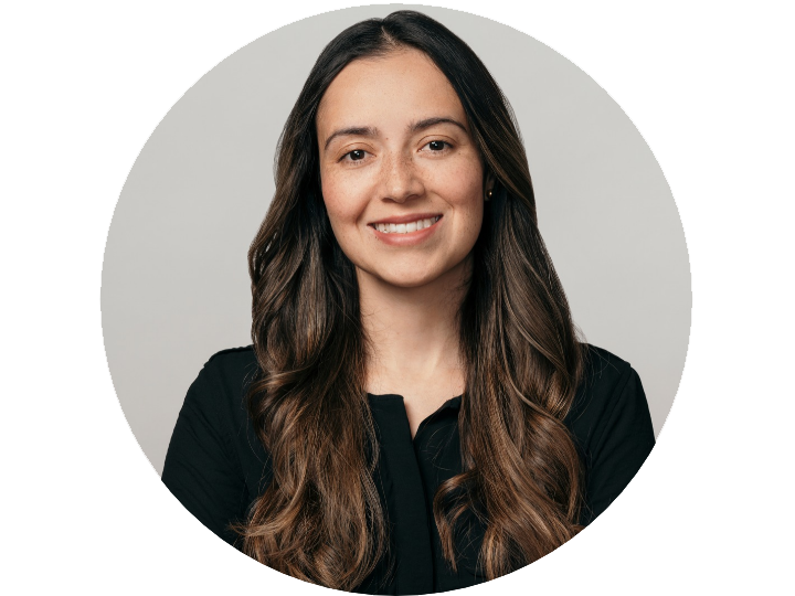 female lady in a black blazer and black shirt