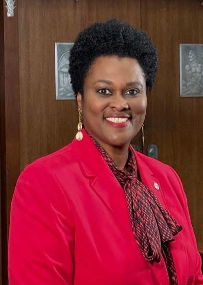 women in red with a dark red scraf