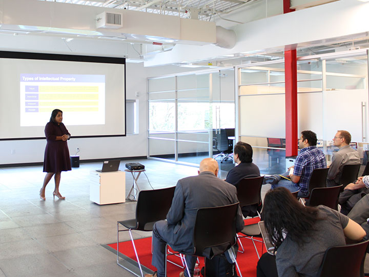 Karthika Perumal, Ph.D., presenting before community