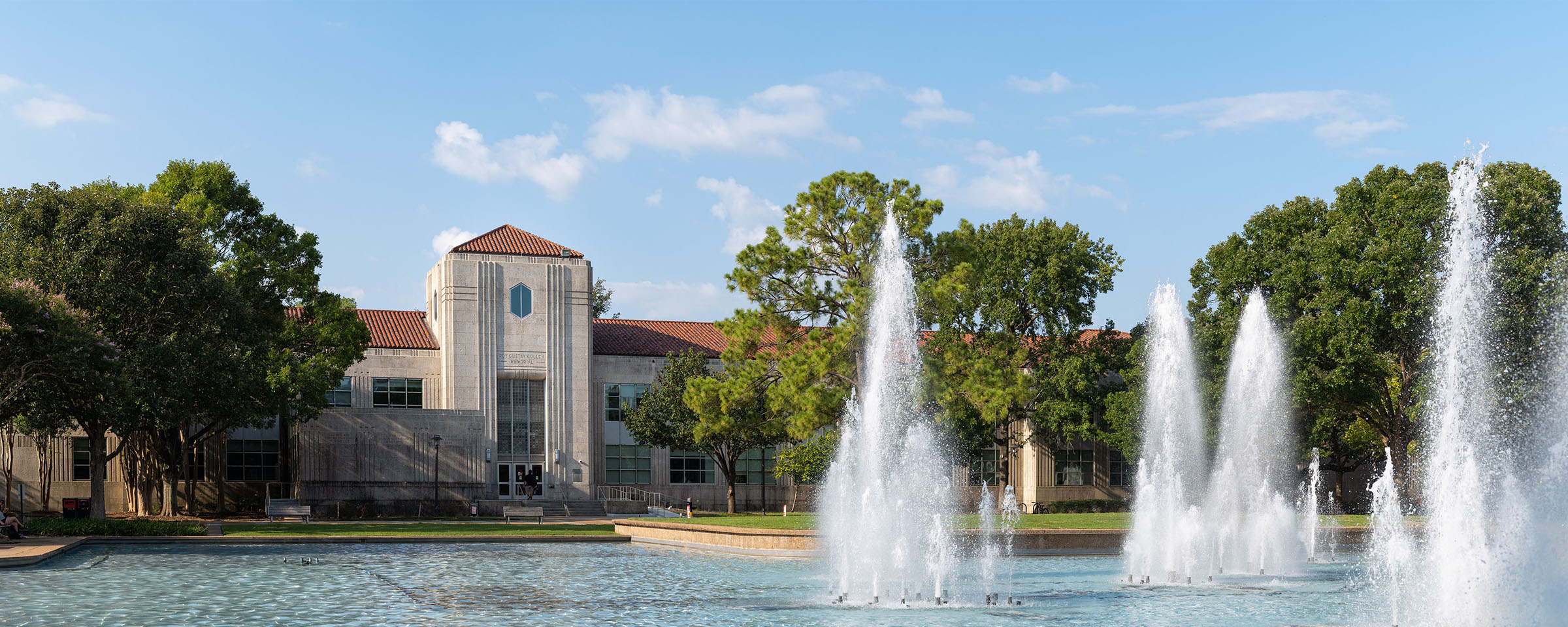 Roy G. Cullen Building with Cullen Family Plaza fountains in the foreground.