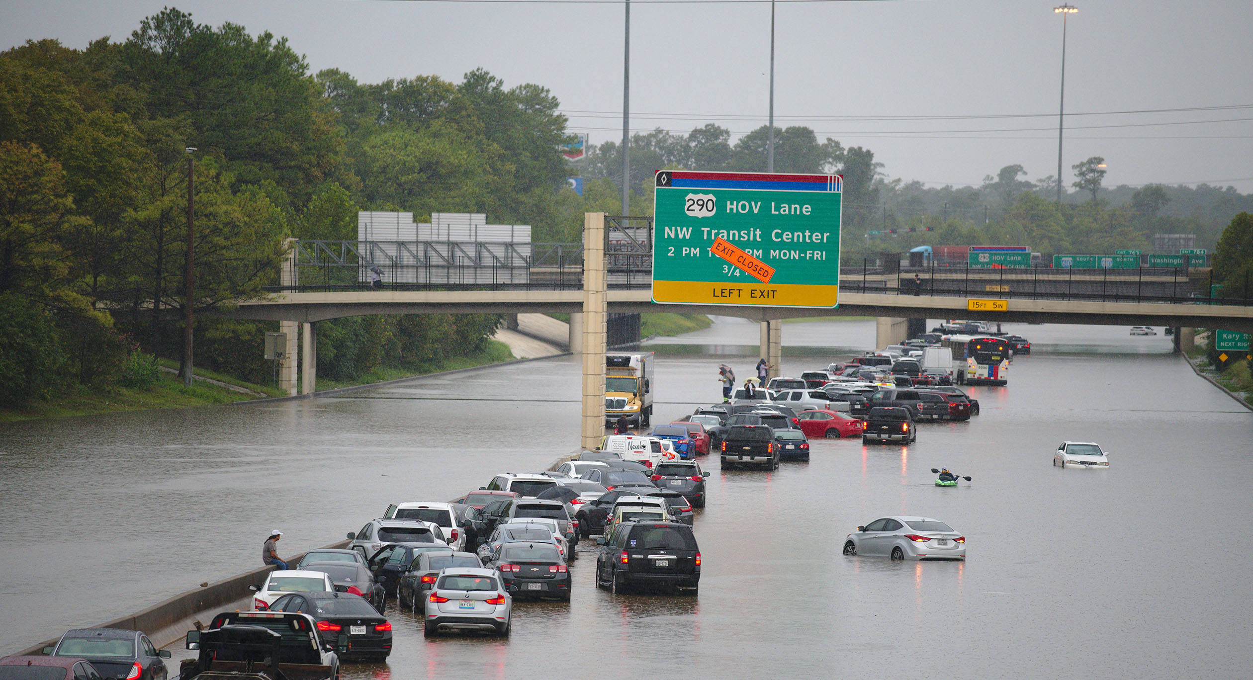 Cars stuck in floodwaters on Houston highway