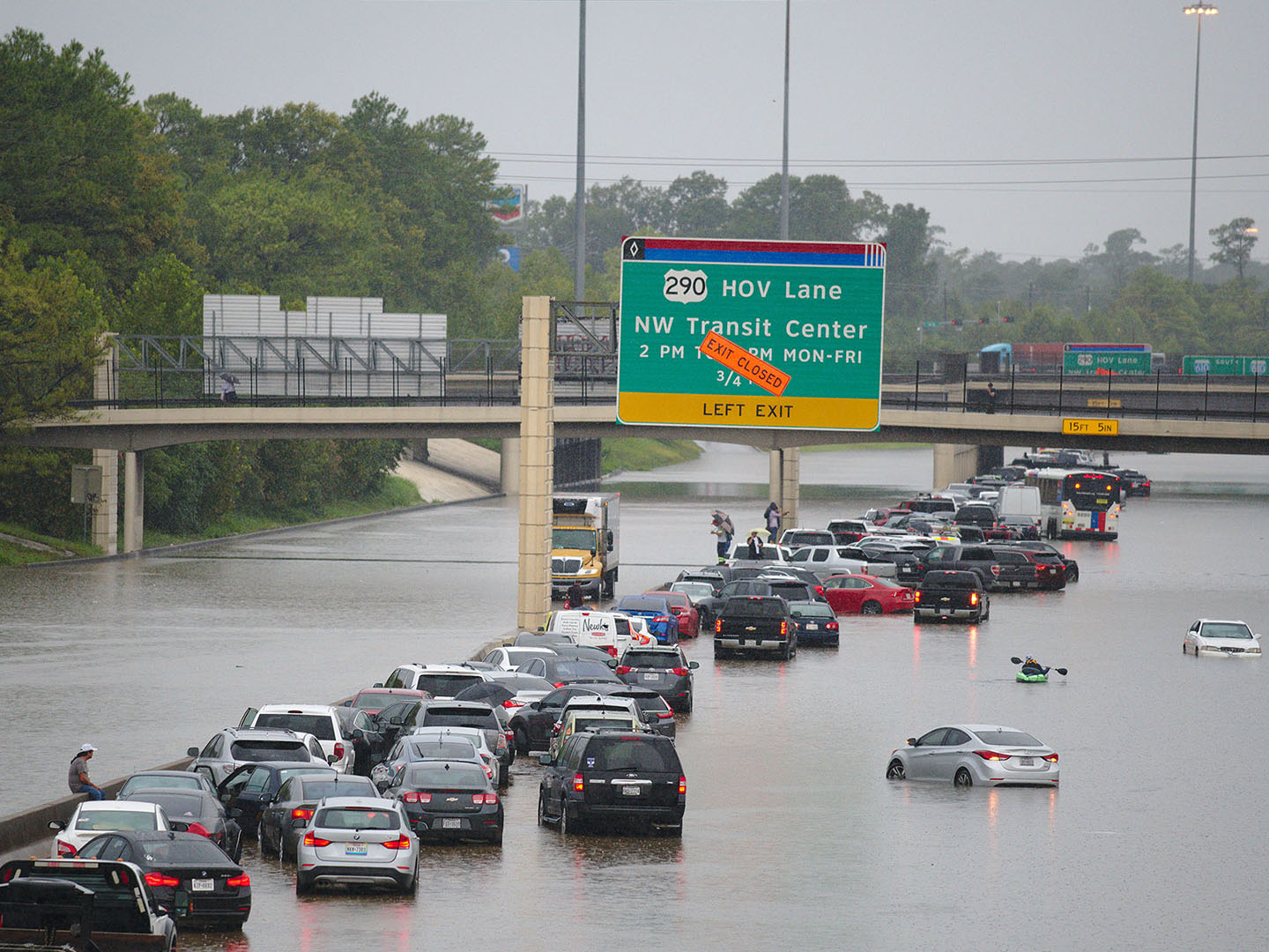 Cars stuck in floodwaters on Houston highway