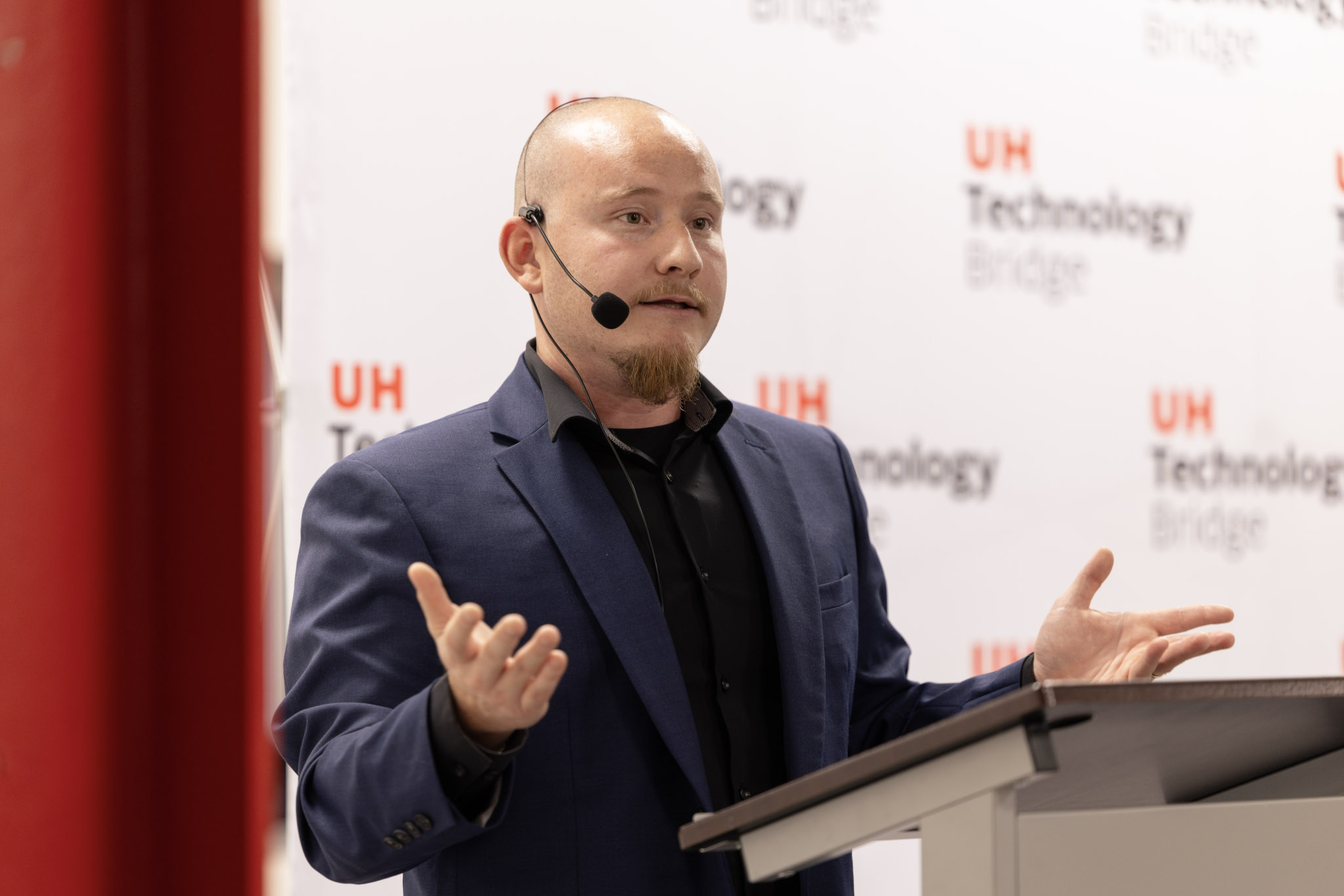 This is an image of Armando Julien presenting his pitch.