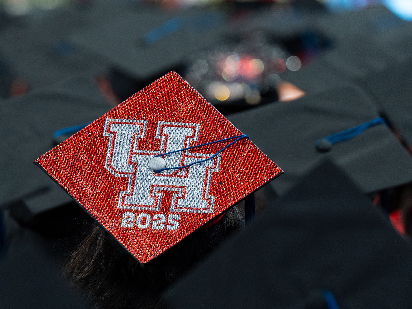 Bedazzled UH graduation cap with the year 2025.