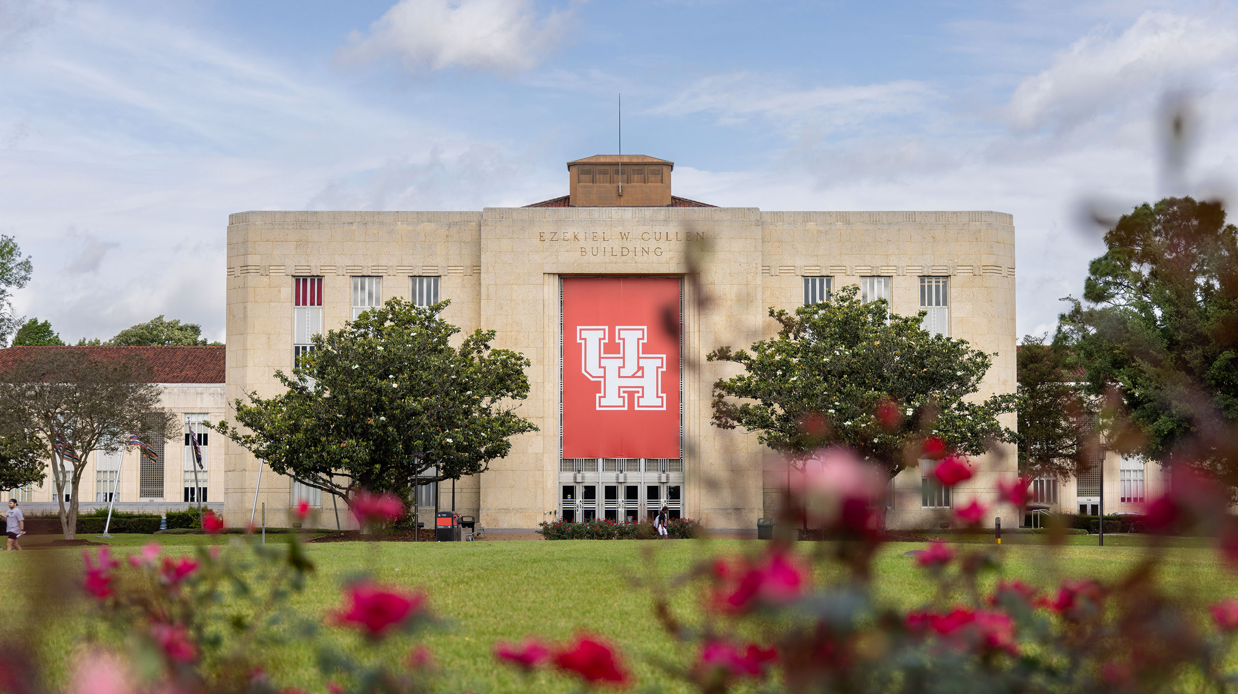 Red UH Banner on the Cullen Performance Hall.