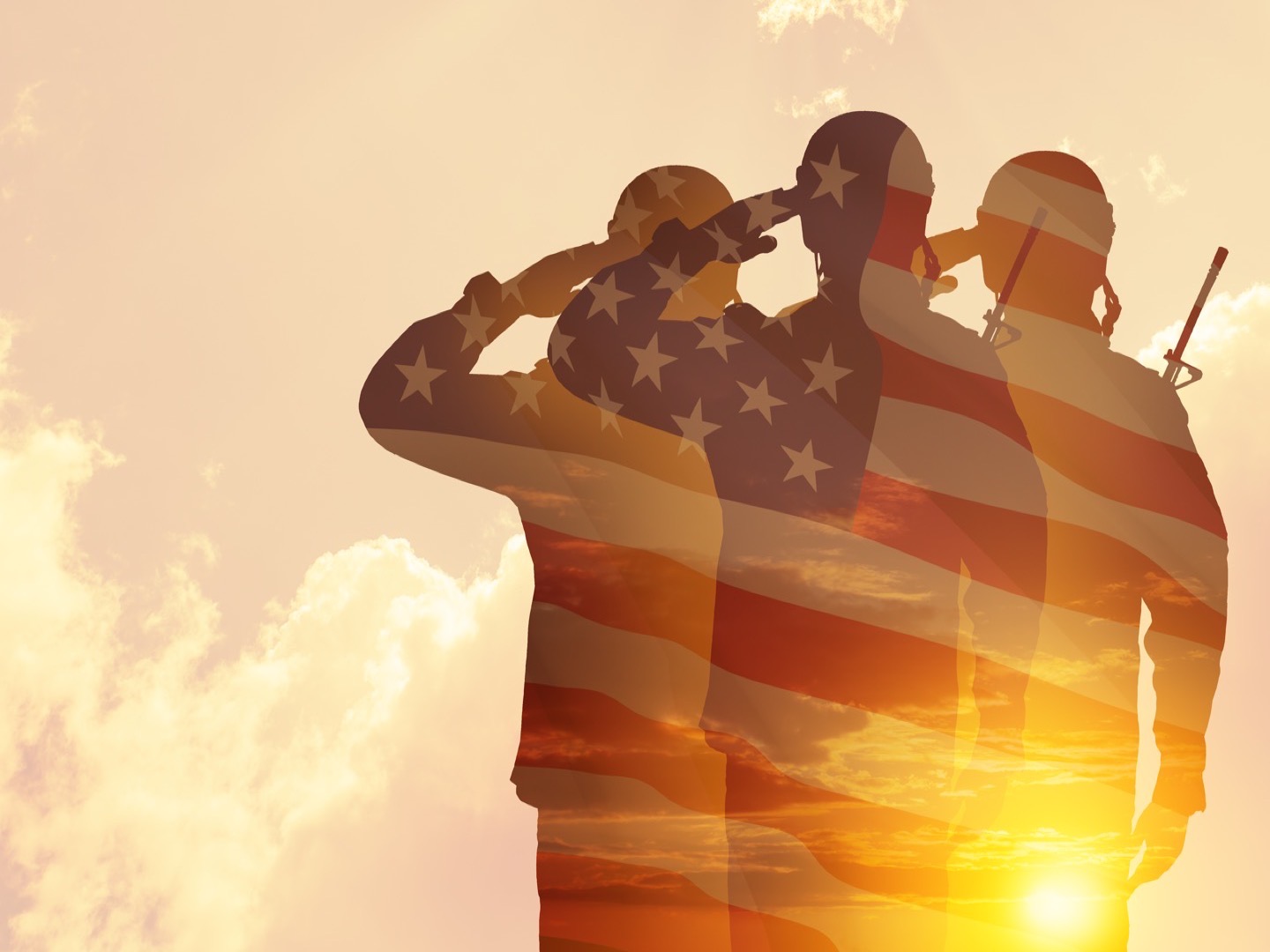 Three soldiers in military uniforms saluting against a sunset sky with an American flag overlay.