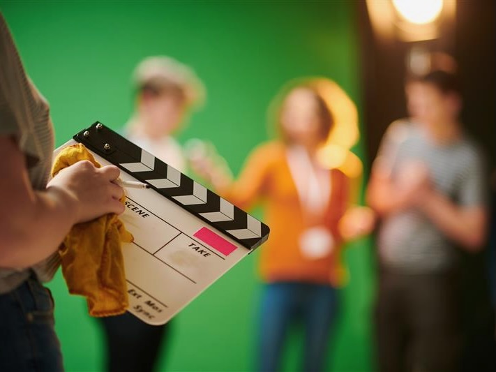 Getty image of student wiping film slate