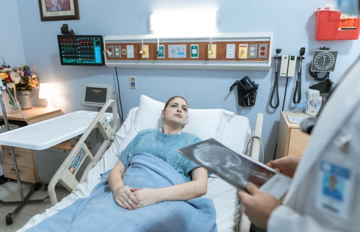 Sick woman in hospital small image