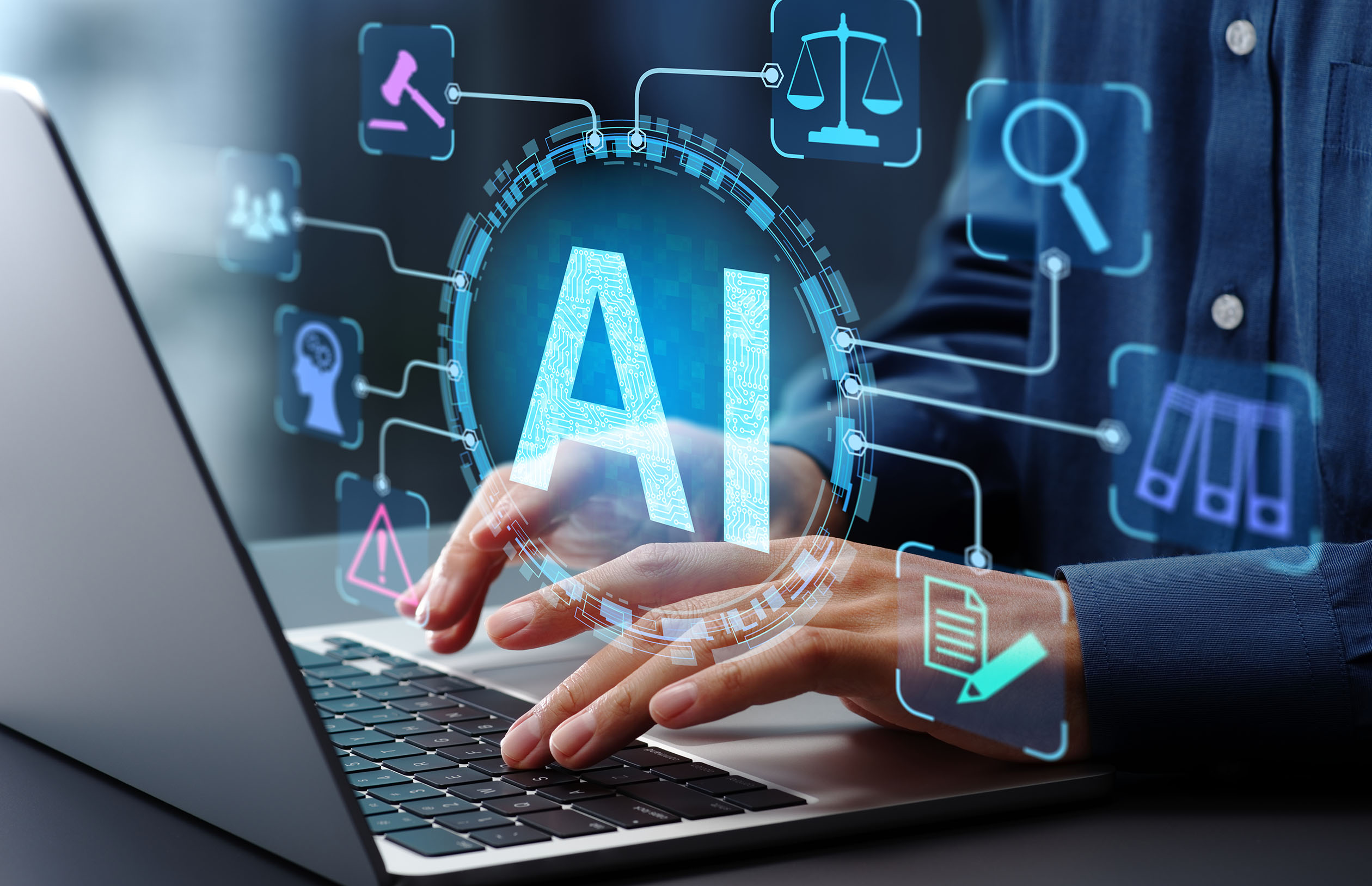 A person is typing on a laptop. The large letters "AI" are prominently displayed in the center. Surrounding icons include a gavel, scales, magnifying glass, gears and documents, symbolizing various applications of artificial intelligence.