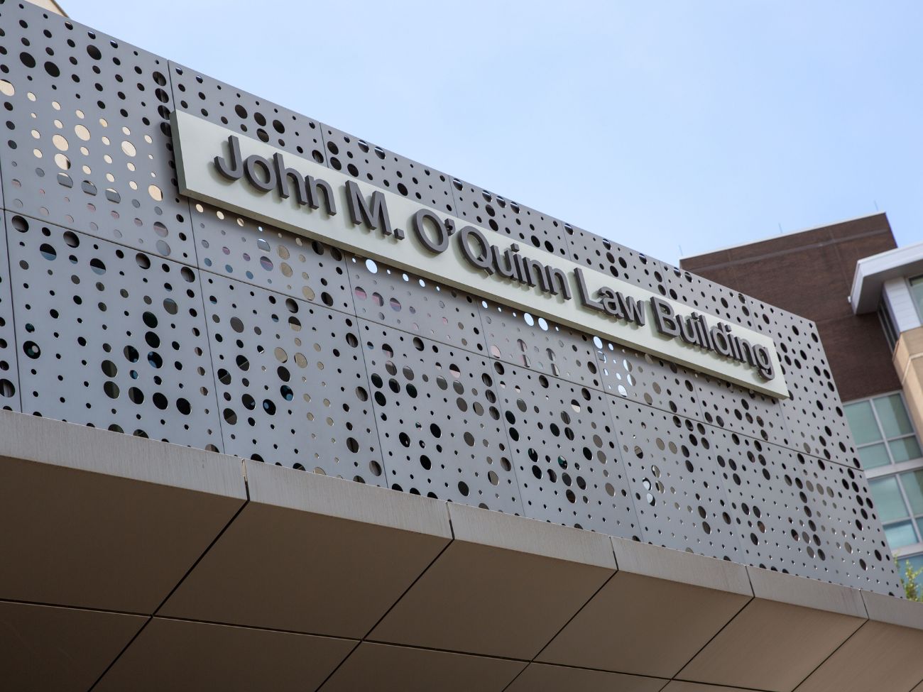 exterior photo of the uh law center building