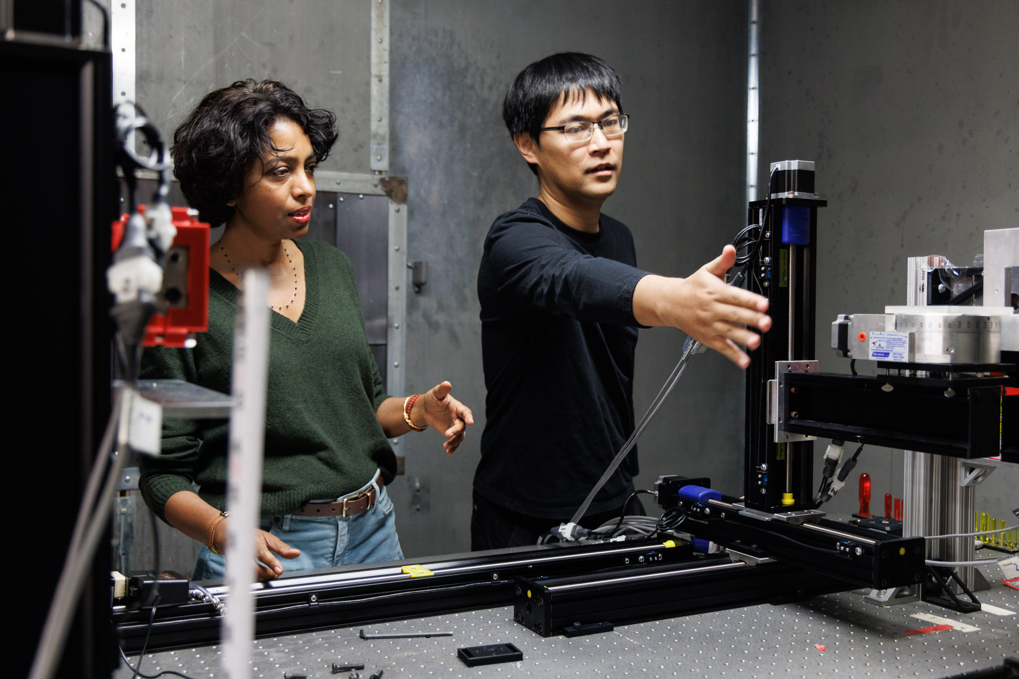 From left: Professor Mini Das and researcher Jingcheng Yuan stand in front of a home-built X-ray unit at the University of Houston. Das and her team have developed a new X-ray imaging method capable of producing multi-contrast imaging.