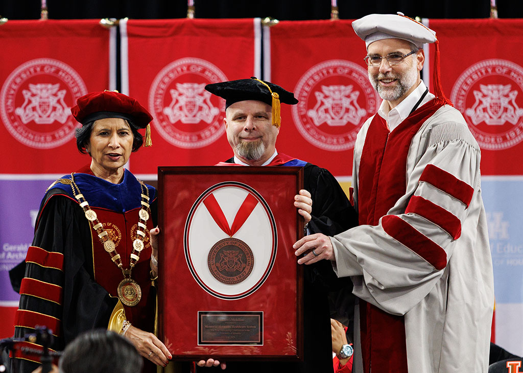 James McCarthy, Memorial Hermann Health System, with President Renu Khator (left) and Dean Dudley (right).