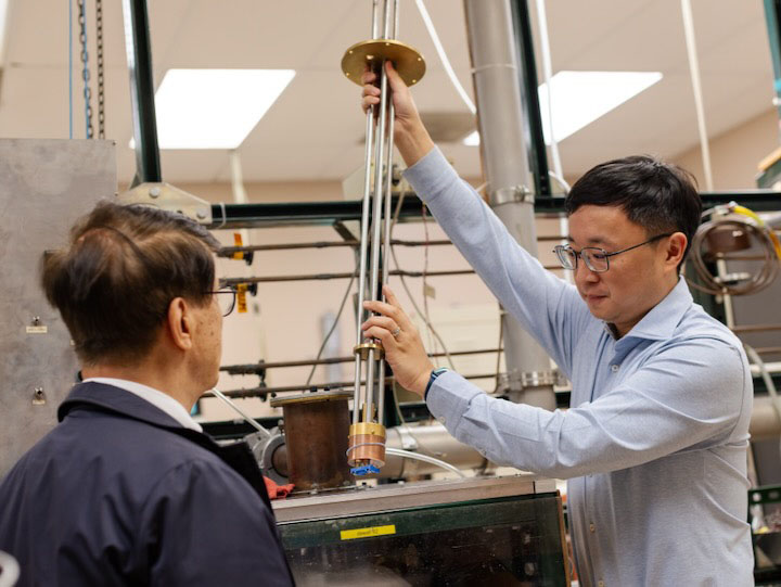 From left: Paul Ching-Wu Chu and Liangzi Deng developed a pressure-quench protocol to stabilize high-pressure metastable phases at ambient pressure. These are the instruments used to validate high temperature superconductivity results at record ambient pressure.