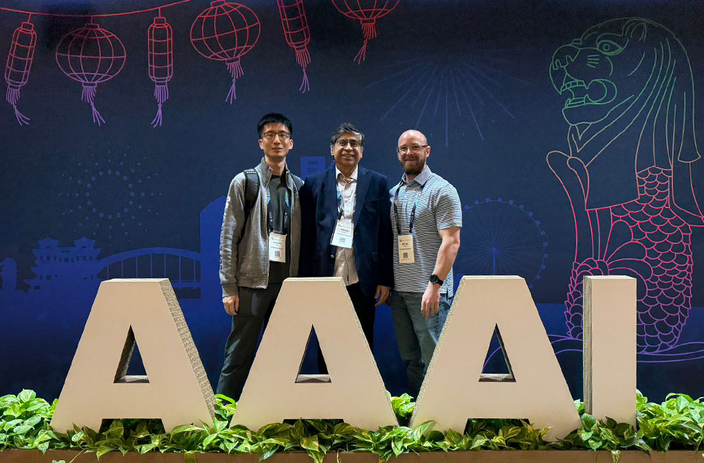 Bryan Tuck along with his mentor, Rakesh Verma (center), and Jinchao Ni (left).