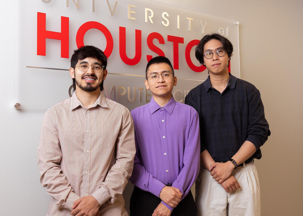 From left: This semester's winning team was Cameron Rojas, Erick Becerril and Long Tran, who developed an algorithm for photographic kinship verification.