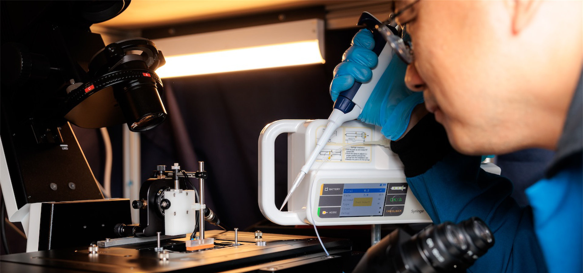 Professor Shoujun Xu (pictured) is collaborating with Professor Yuhong Wang to study how microscopic molecular "machines" inside cells use energy and change shape to build proteins.