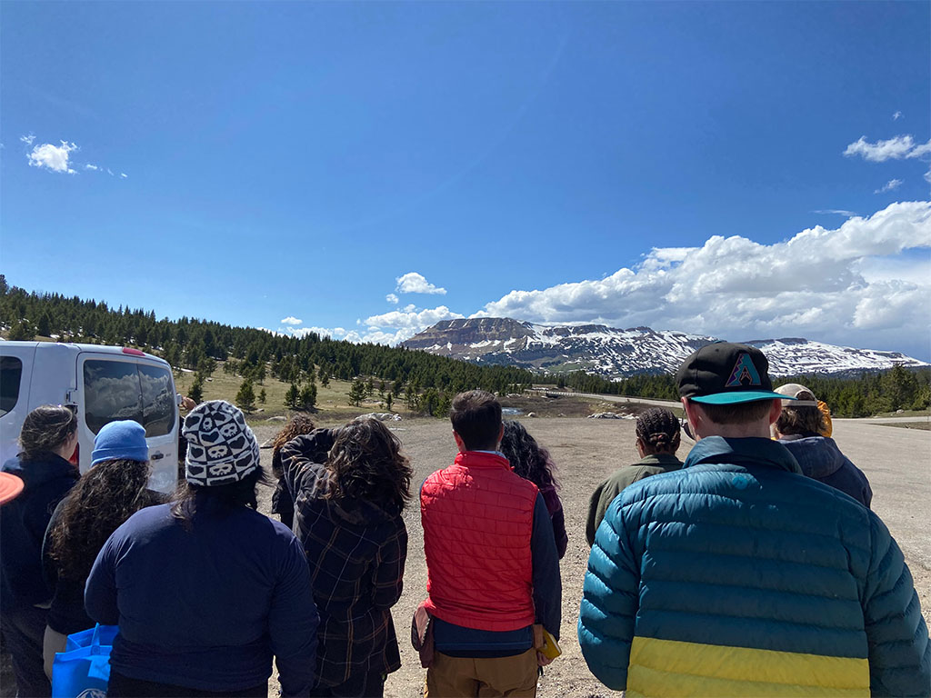 Students observe the Beartooth Butte formation along with other familiar stratigraphy from Towne Point Mountain. Photo credit: Jack McLaughlin, TA
