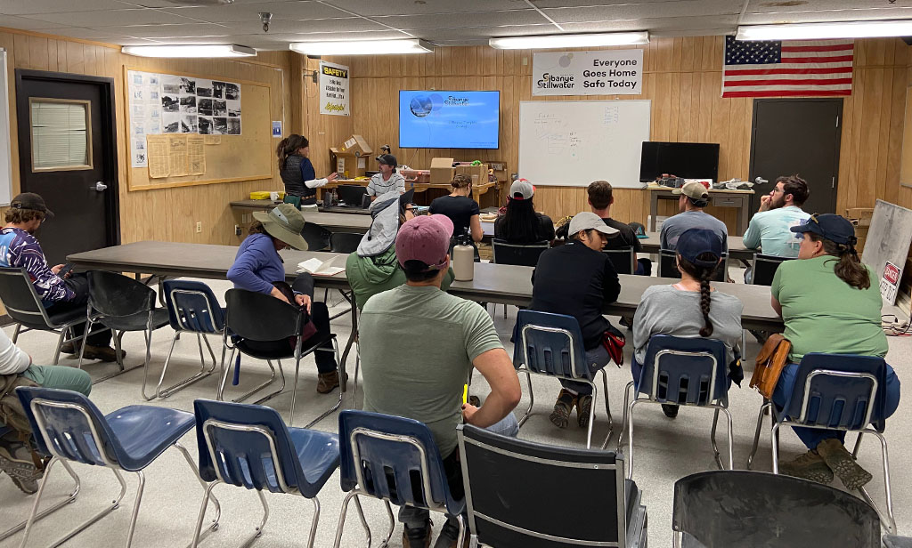 Kevin Butak, a resource geologist at Stillwater Mine and our host, plays a mandatory safety video all who visit the mine must watch. Photo credit: Jack McLaughlin, TA