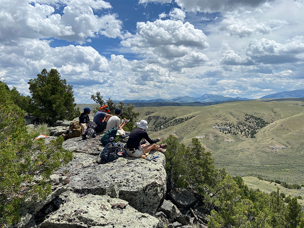 Students taking a quick lunch break and taking in the view after being cut loose for the day. Photo credit: Jack McLaughlin, TA
