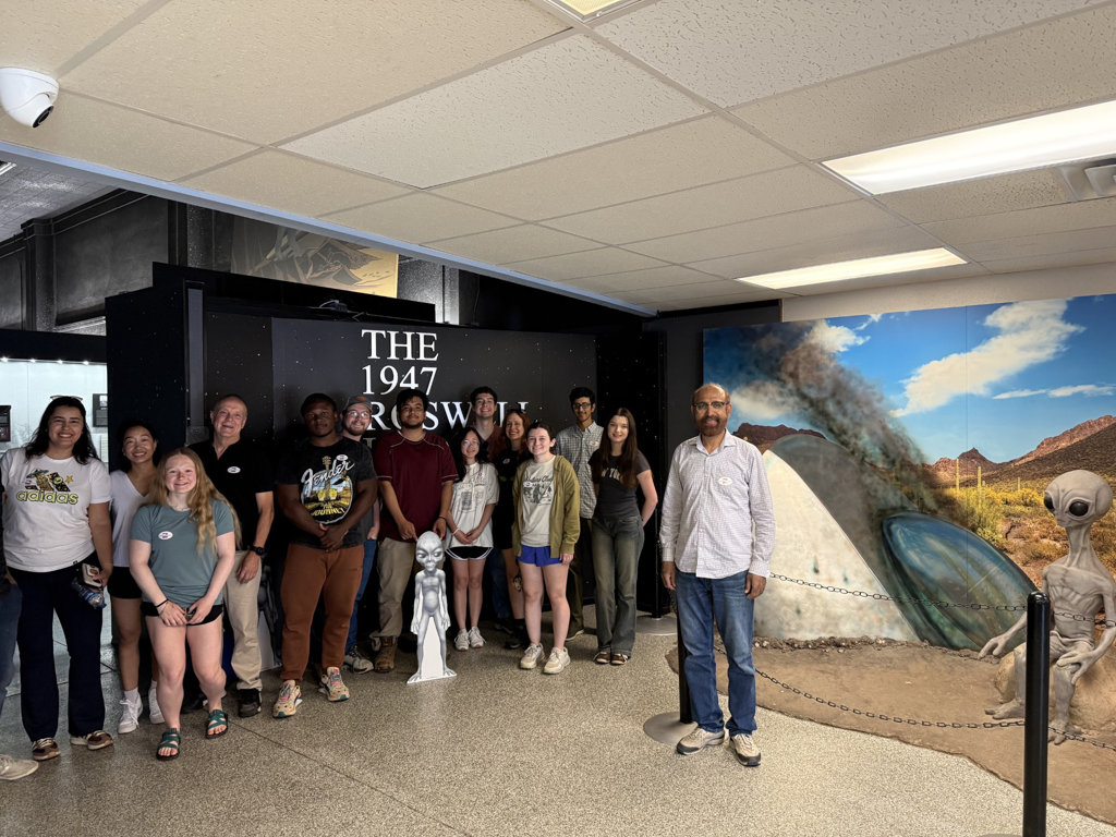 Course instructor Dr. Robert Stewart, research scientist, Graduate and undergraduate students in Internation UFO museum. Picture Credit: Dr. Robert Stewart