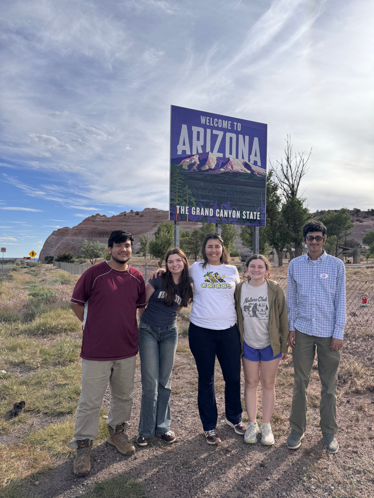 The group of students at the Arizona state boundary during our journey to Arizona.