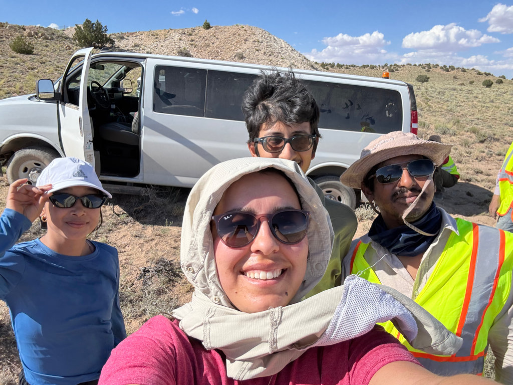 A bunch of Geoscientists at the outer rim of Meteor Crater. Fieldwork doesn’t always go as planned! On the second day of surveying at the Meteor Crater, the field van found the soft sand a little too inviting, resulting in a three-hour recovery effort. Moral of the story: Out in the wild, soft sand puts up a good fight, but teamwork always wins. Picture credit: Nilay Gungor