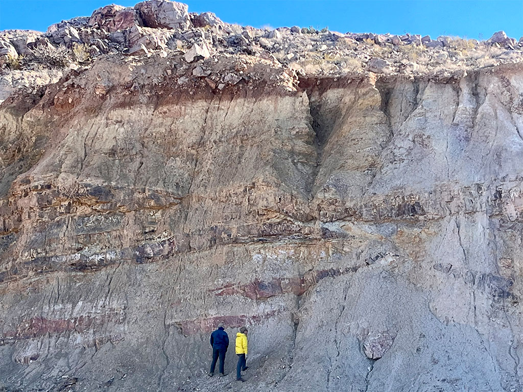 UH Professor examines faulted outcrop in New Mexico with guest researcher on 2024 Winter Trip. (Photo credit: Jamie Jetton)