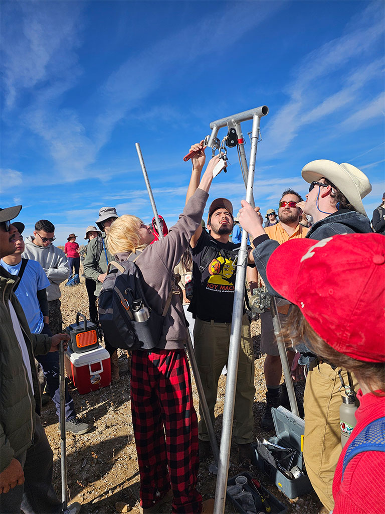 Students are guided in setting up coring equipment and learn about how to plan field site locations. Photo credit: Danielle Pace