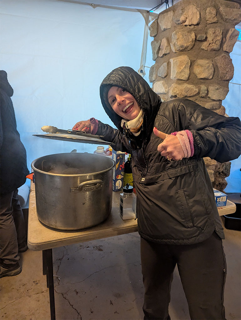 Dr. Carlson slinging some noodles on spaghetti night. Photo credit: Cristina Romano