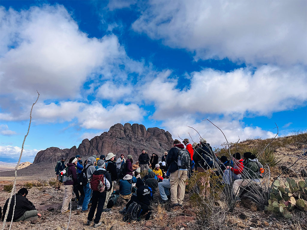 Dr. Pete Copeland, who has led geological trips to NM since 2012, gives us the historical breakdown of what we're sitting on. We tried to get a song out of him but performances will have to wait until evening. Photo credit: Jamie Jetton