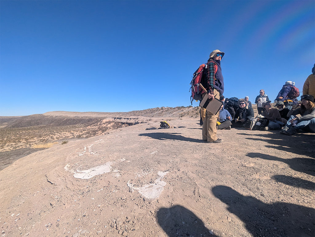 Dr. Jinny Sisson standing on the crater rim while lecturing on what we would see. Photo credit: Cristina Romano