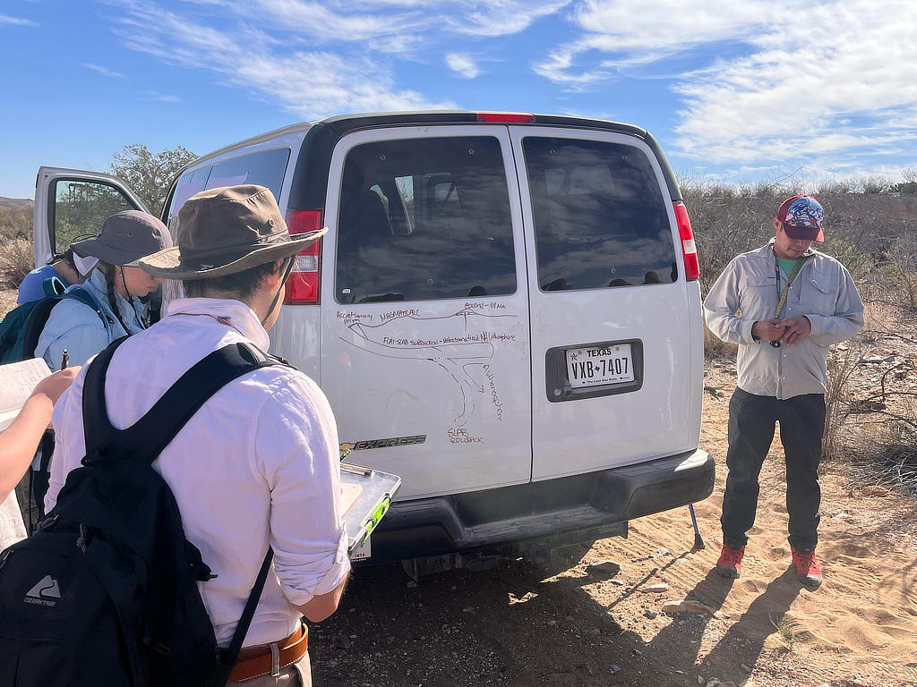 Photo Credit: TA Abe Okayli Masryk - Professor Dr. Mike Murphy relating the local geology to the regional tectonic history of North America.