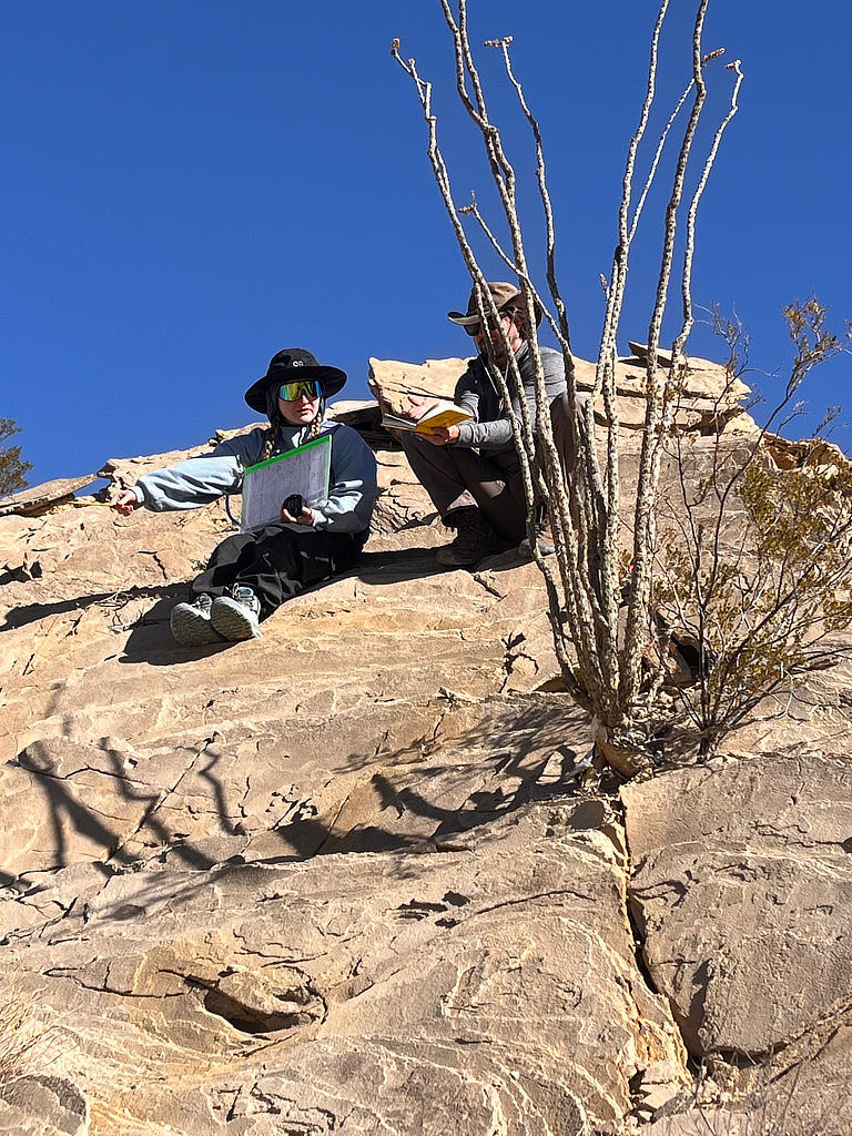 Photo Credit: TA Abe Okayli-Masryk - Teaching assistant Michael Daniel explains how to visualize the structure from its formation to its deformation to student Rebekah Wells-Moore.