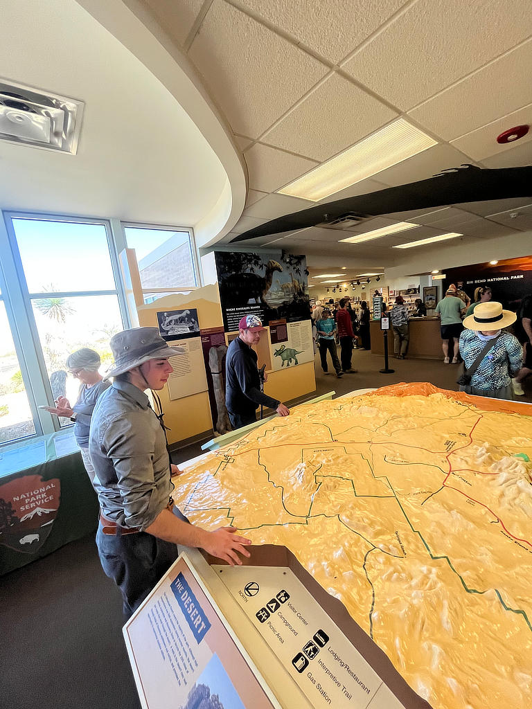 Photo Credit: TA Michael Daniel - Student Matthew Santos and professor Dr. Mike Murphy inspect the 3D map of the extent of Big Bend National Park at Panther Junction.