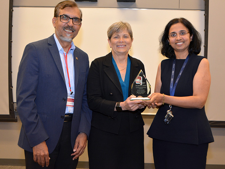 Hussain, Kroetz and Trivedi with plaque