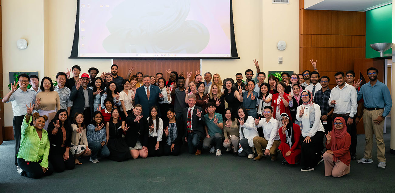 group photo of symposium attendees