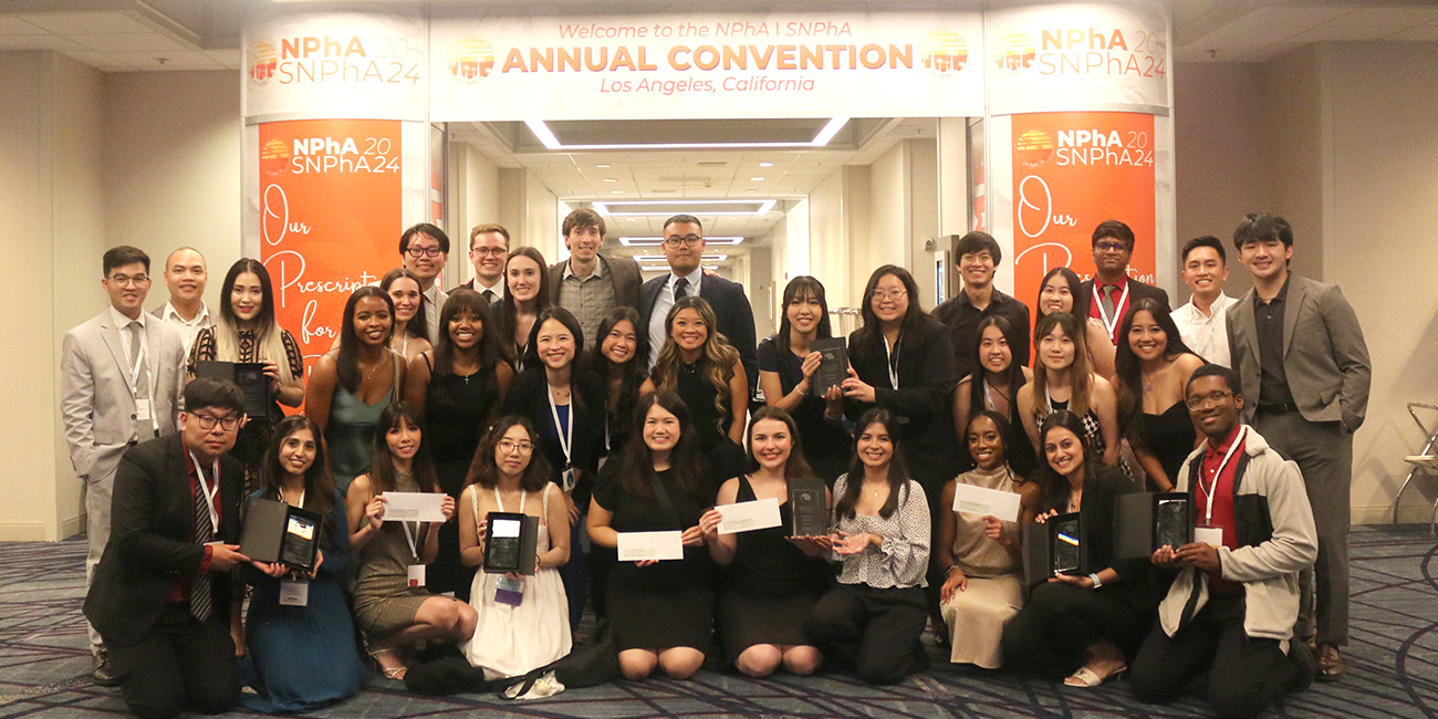 group photo of SNPhA chapter members with awards