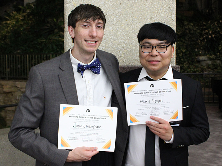 Willingham and Nguyen holding certificates